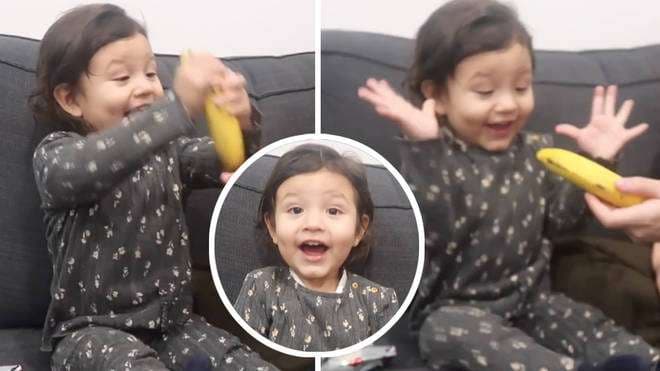 I bën dhuratë një banane për Krishtlindje, babai befasohet nga reagimi i vogëlushes së tij (VIDEO)