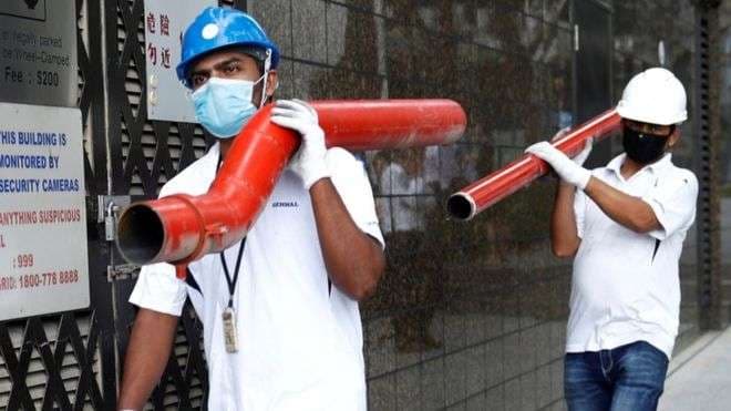 Koronavirusi: Singapori fut në karantinë 20,000 punëtorë të huaj