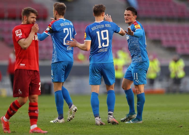 Holstein Kiel afër Bundesligës, ndeshja e dytë e barazhit Kiel – Koln ekskluzivisht në Artmotion