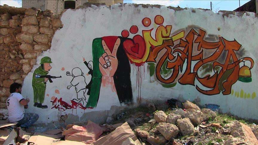 Artisti sirian mbështet me grafite palestinezët